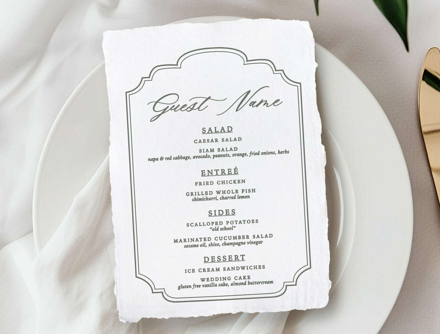 Table setting with a menu card on a white plate, accompanied by flowers and cutlery.