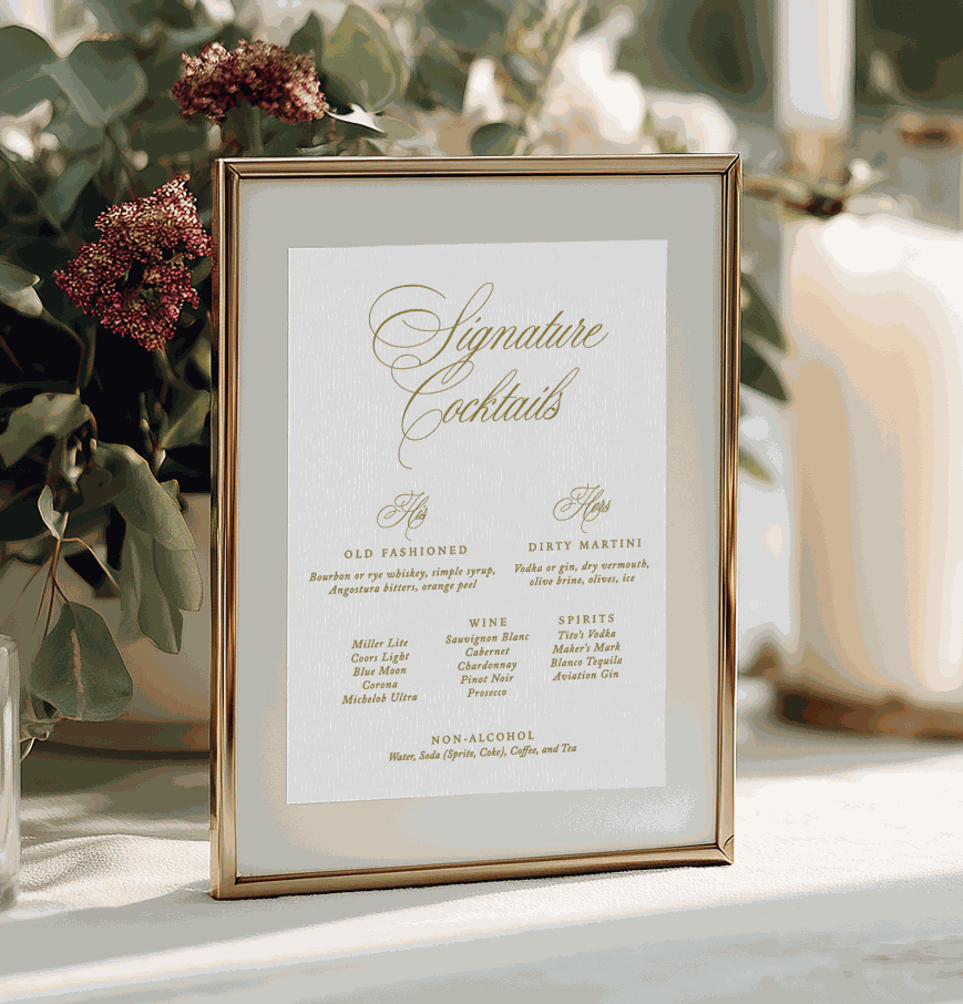 Framed cocktail menu with decorative plants and candles in the background